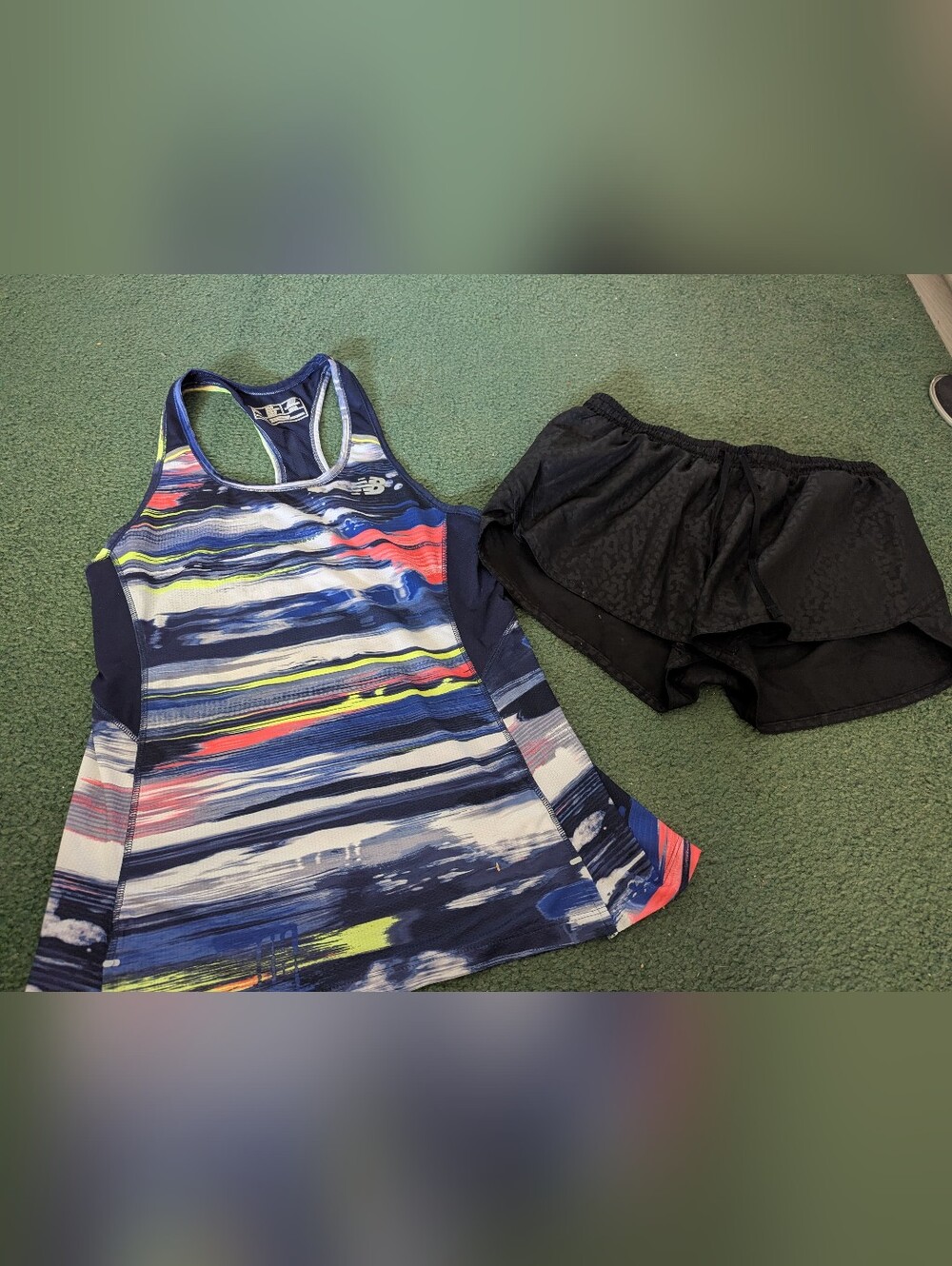 New Balance Women's Multicolor Striped Muscle Tank - Navy, White, Pink, Yellow.